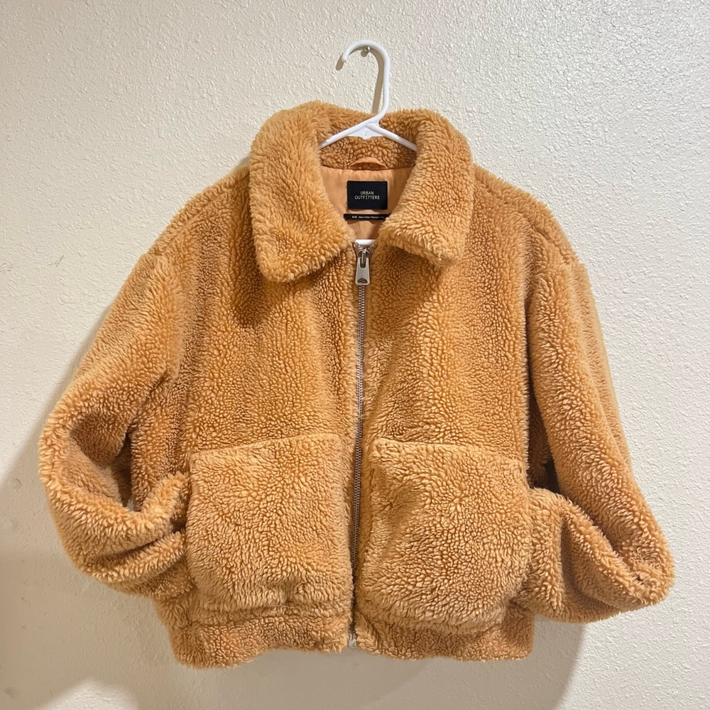 Golden Brown Urban Outfitters teddy fleece cropped jacket.